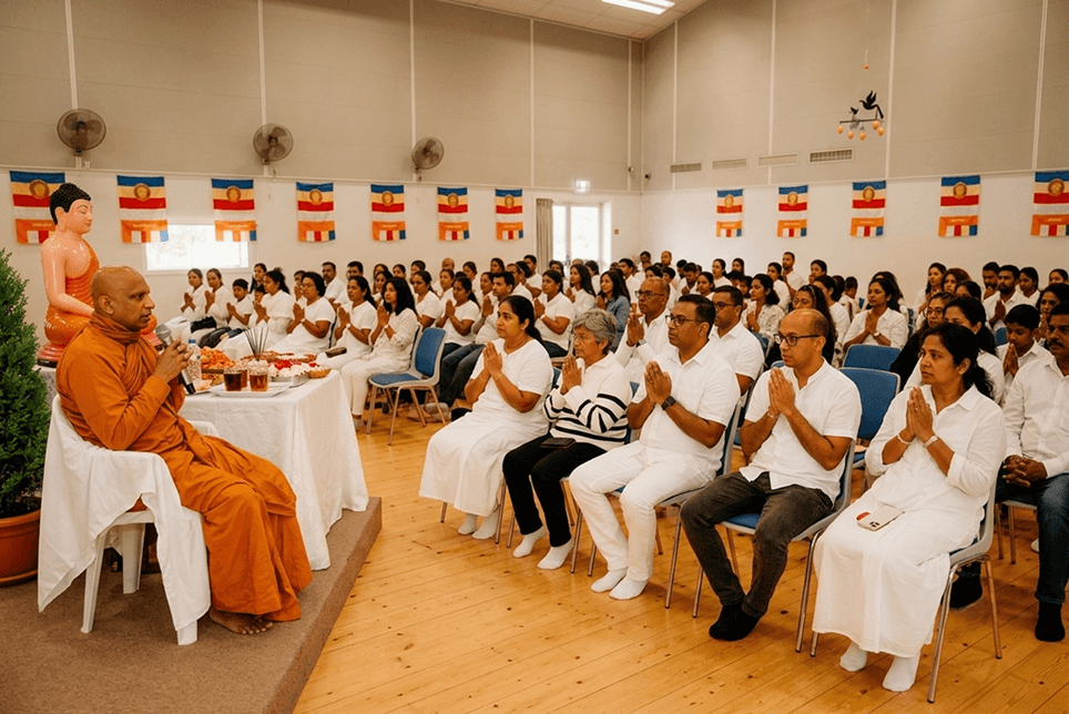 Devotees in white clothes observing precepts during Sil program